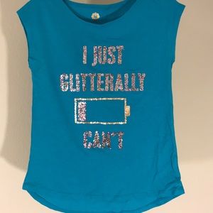 A teal girls shirt